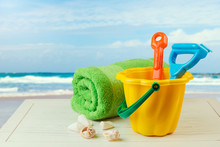 Children Bucket And Spade For Relaxing Day On The Beach