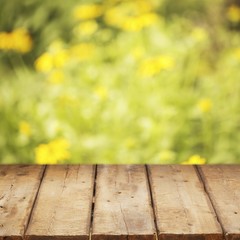 Wall Mural - Outdoor. Retro rustic table of free space and orange garden