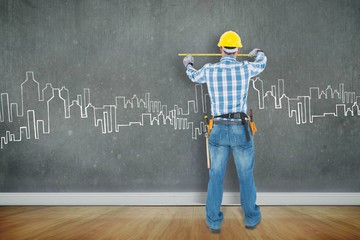 Poster - Construction worker using measure tape