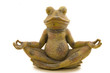 stone frog meditates on a white background