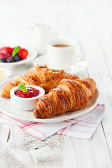 Wall Mural - Fresh croissants with jam