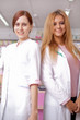 © DC Studio - Two young female doctor smiling