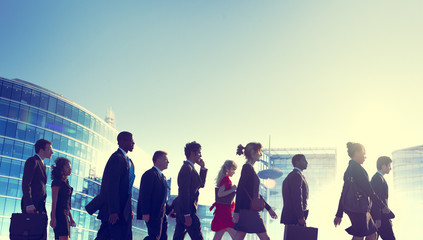 Canvas Print - Group of Business People Walking Back Lit Concept