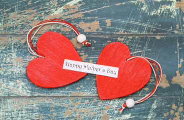 Wall Mural - happy mother's day card with two red hearts