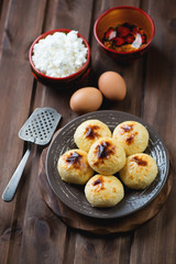 Wall Mural - Cottage cheese pancakes and cooking ingredients, studio shot