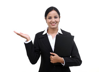 Wall Mural - Young businesswoman holding file