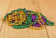 Purple, green and gold Mardi Gras beads.