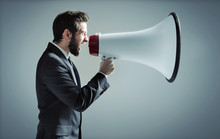Conceptual Photo Of Man Yelling Over The Megaphone