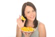 Attractive Young Woman Holding a Plate of Sliced Oranges