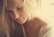 © VectorART - portrait of a beautiful blonde at home by the window