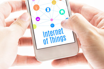 Poster - Close up Two hand holding smartphone with Internet of things wor