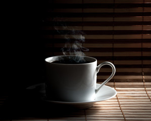 Canvas Print - Coffee cup  on old wooden background