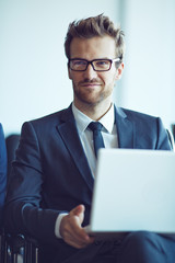 Canvas Print - Businessman with laptop