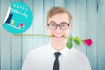 Poster - Composite image of geeky hipster holding a red rose in his teeth