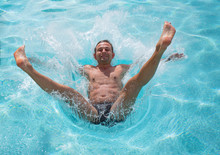 Man Jumping In Swimming Pool