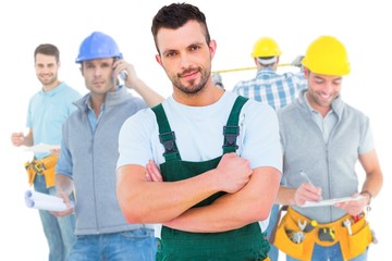 Poster - Composite image of carpenter smiling at camera