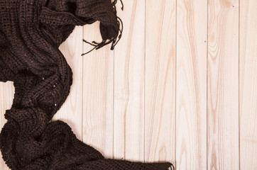 brown scarf on wooden background