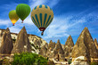 © Travel Faery - Goreme, Turkey. Mountain landscape. Hot air balloons in Cappadoc