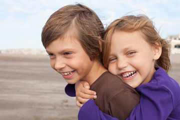 portrait of two happy friends outdoors