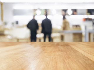 Wall Mural - Table Top with Blurred people in shop interior background