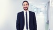 © WavebreakMediaMicro - businessman in suit standing with hands in pockets