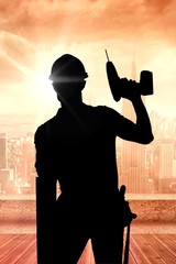 Poster - Image of carpenter holding drill machine