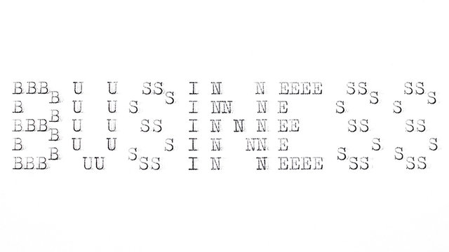 Business word printed on an old typewriter