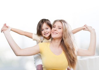 Background. CLoseup portrait of happy  white mother and young