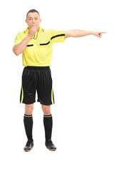 Wall Mural - Angry football referee blowing a whistle