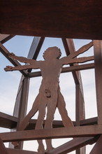 A Wooden Sculpture Leonardo's Vitruvian Man.