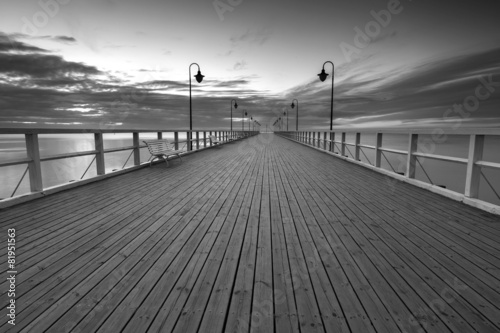 Fototapeta na wymiar Beautiful long exposure seascape with wooden pier