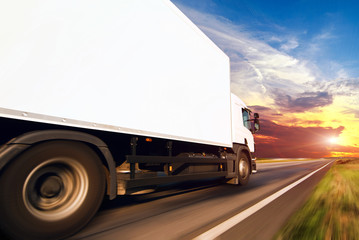 White truck on the asphalt road