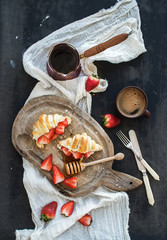 Wall Mural - Breakfast set. Freshly baked croissants with strawberries