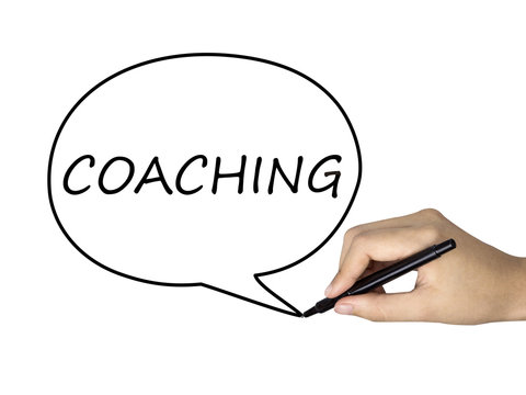 coaching word written by human hand