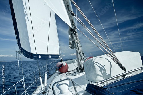 Naklejka - mata magnetyczna na lodówkę Sailing yacht on a cruise deck view