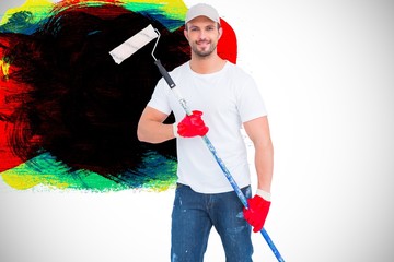 Poster - Composite image of handyman holding paint roller