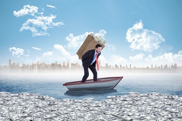 Poster - Composite image of businessman carrying bag of dollars