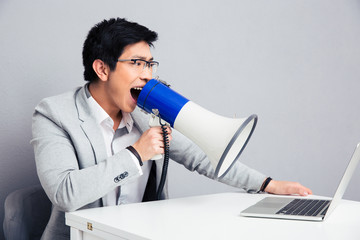 Poster - Businessman screaming in megaphone on laptop