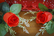 Valentines Day with heart and roses on wood background
