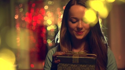 Sticker - Beauty girl opens Christmas gift box with miracle gift