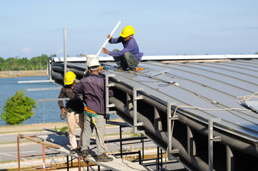 A group of construction worker are working together