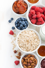 Wall Mural - cereal and various delicious ingredients for breakfast, top view