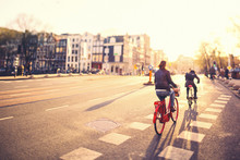 Cycling In Amsterdam At Sunset