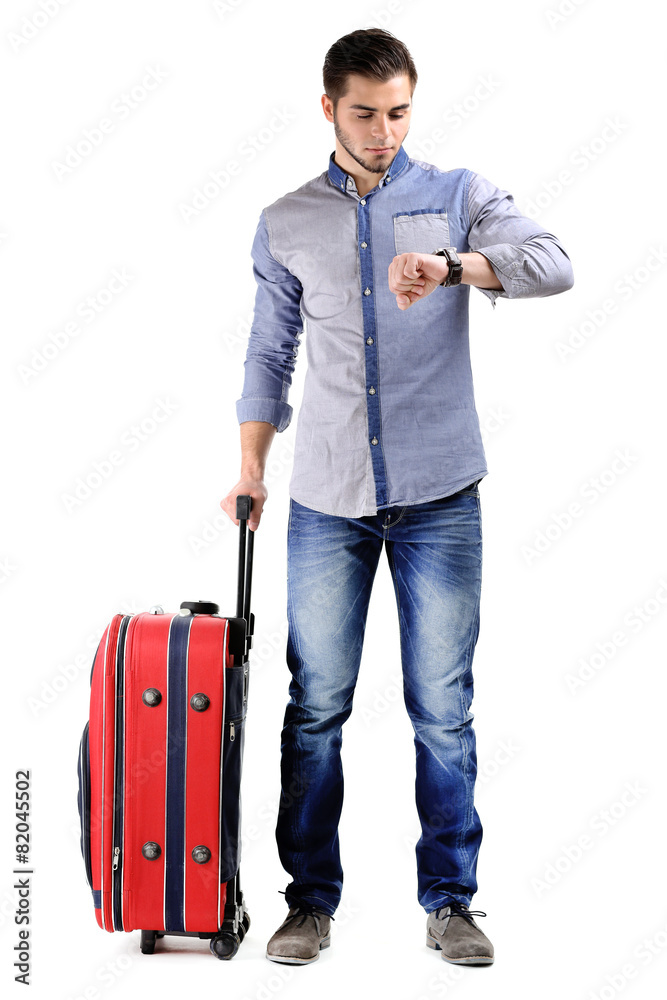 Man in blue shirt and jeans with suitcase isolated on white
