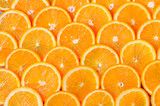 Fototapeta Panele - Orange Slices Background