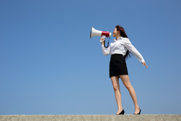 Wall Mural - business woman shouting megaphone