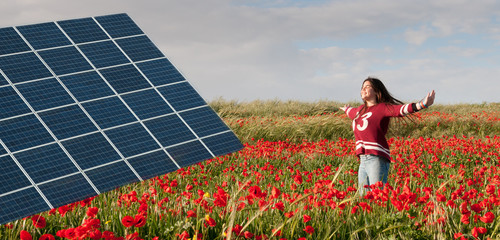 solar energy panel and teenage girl on a field with red poppies.