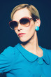 © ysbrandcosijn - Fashionable Woman in Blue Dress and Sunglasses