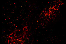 Red Sparks On A Black Background