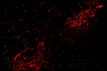 red sparks on a black background